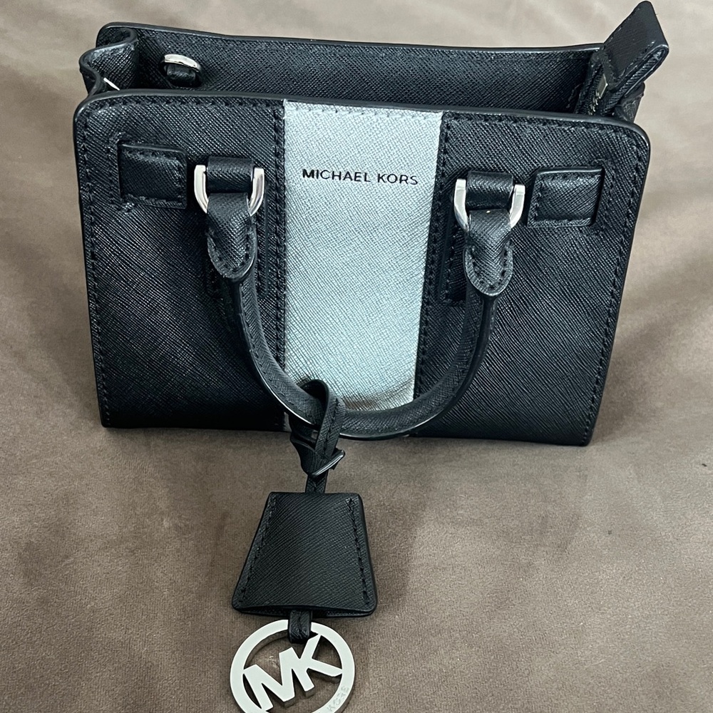 Michael Kors Black and Silver Satchel

Not crossbody